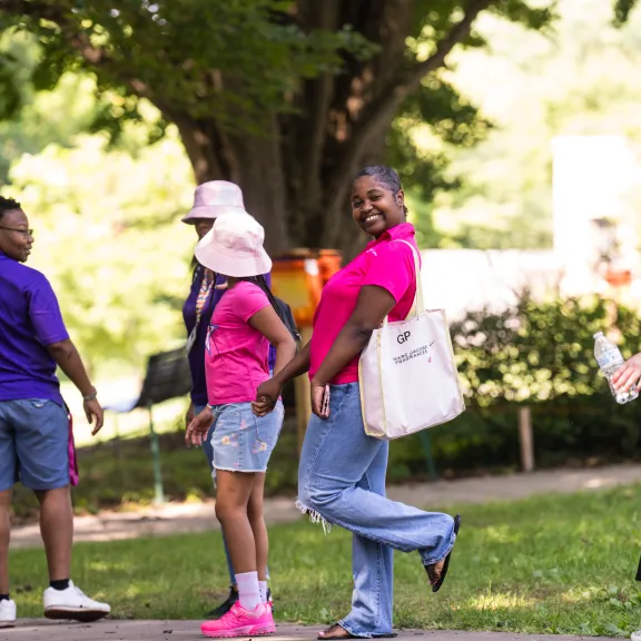 women smiling outside