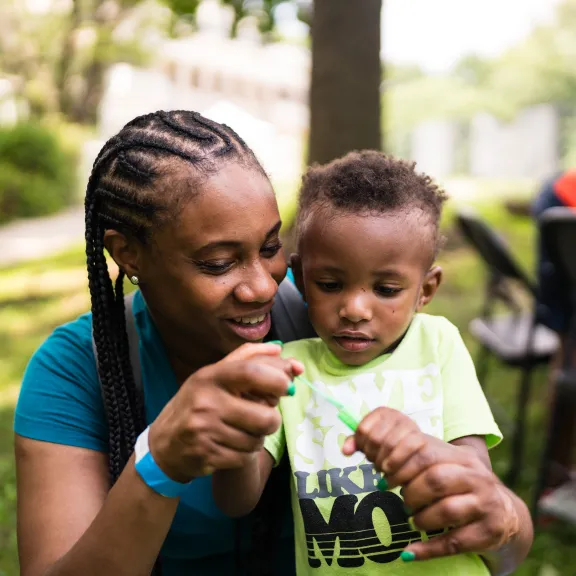 Mom and kid with bubbles
