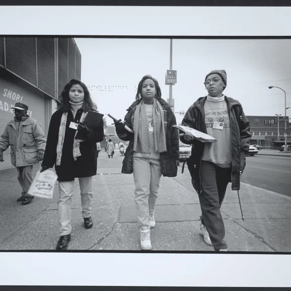 Three women walking together 1980s